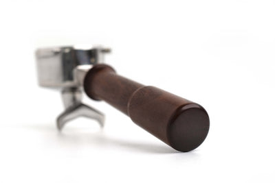 3/4 view of 54 mm breville portafilter handle with double spout in walnut