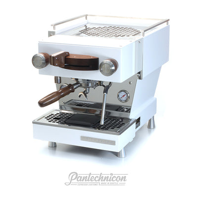 custom linea mini in white, walnut, and stainless steel with acaia scale in drain tray