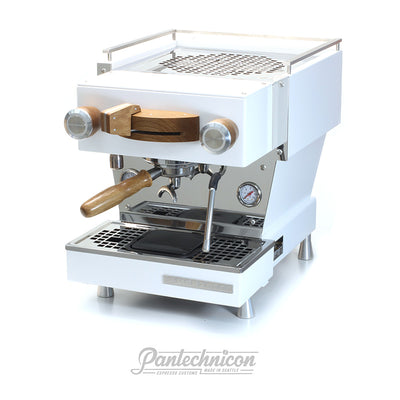 3/4 view of custom linea mini in white, oak and steel 