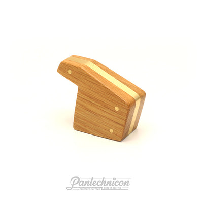 3/4 view of oak and brass brew paddle for la marzocco