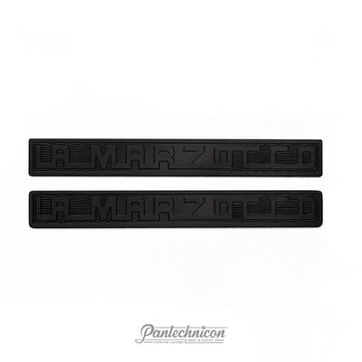La Marzocco sunburst logo badge in anodized black 