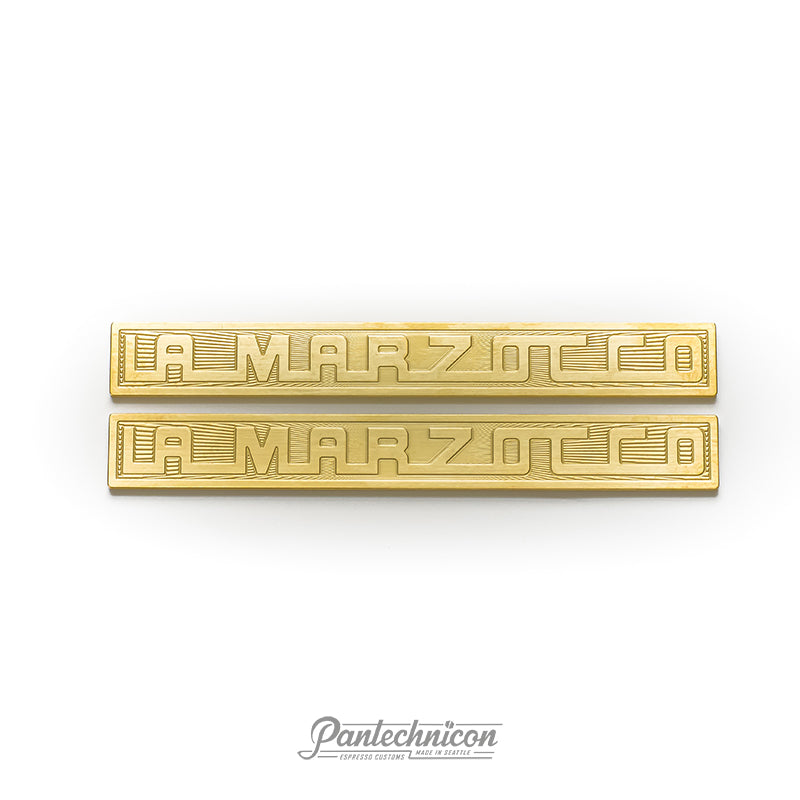 La Marzocco sunburst logo badge in brass