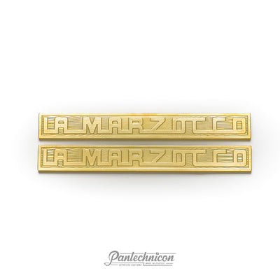 La Marzocco sunburst logo badge in brass