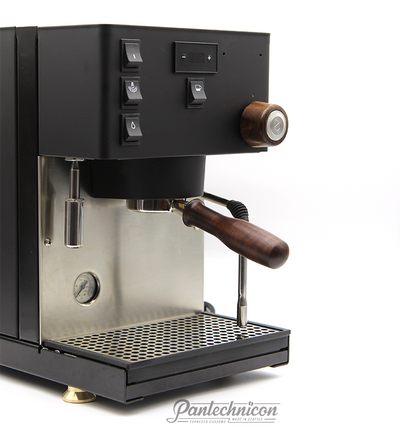 3/4 view of rancilio pro x with custom walnut accessories