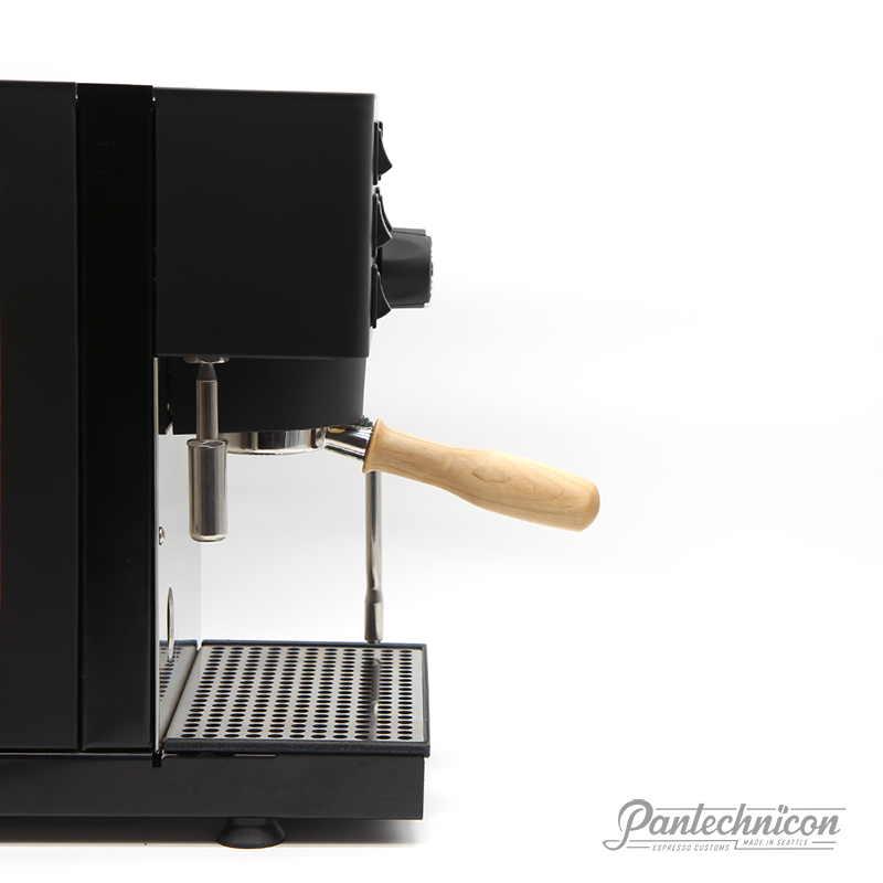 maple handled bottomless portafilter installed on rancilio pro x