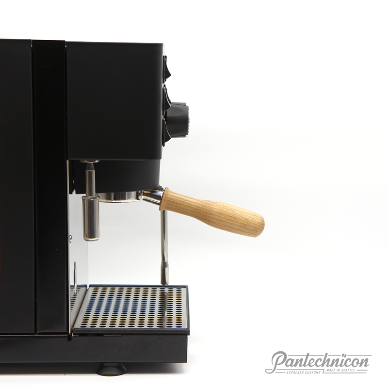 bottomless portafilter with oak handle installed on rancilio pro x