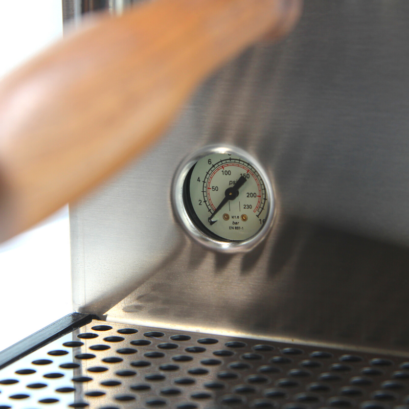 close up of pressure gauge on stainless steel rancilio pro x