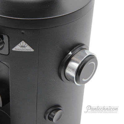close up of adjustment dial on x54 grinder